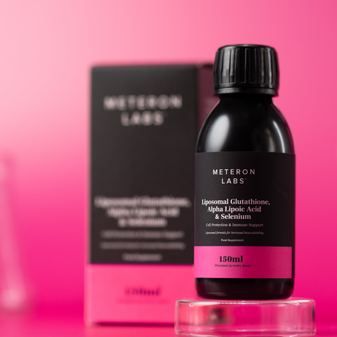 Black bottle with purple label on a pink background, featuring 'Meteron Labs' branding.